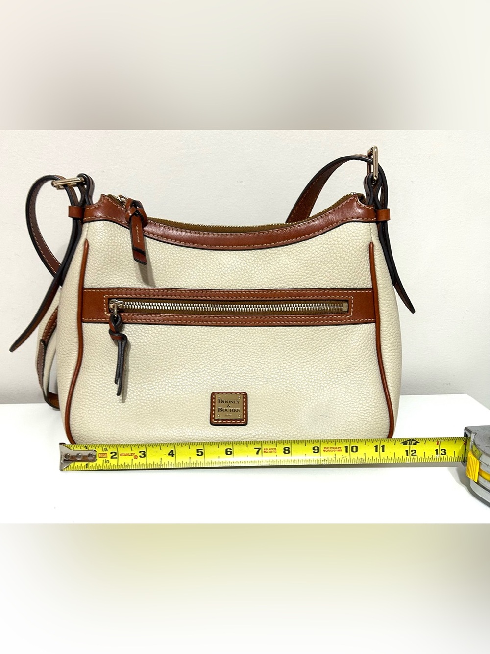 Authentic Dooney and Bourke crossbody, Cream with Brown